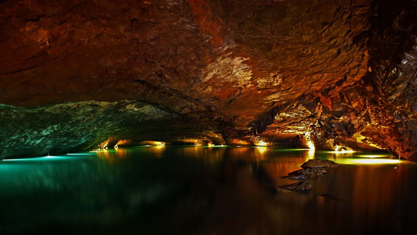 Lake in cave with lights
