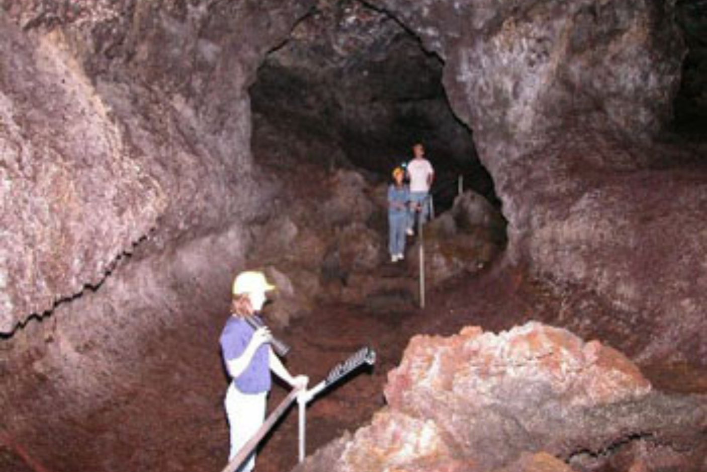 guest walking through cave