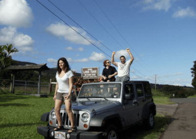 guests riding in jeep