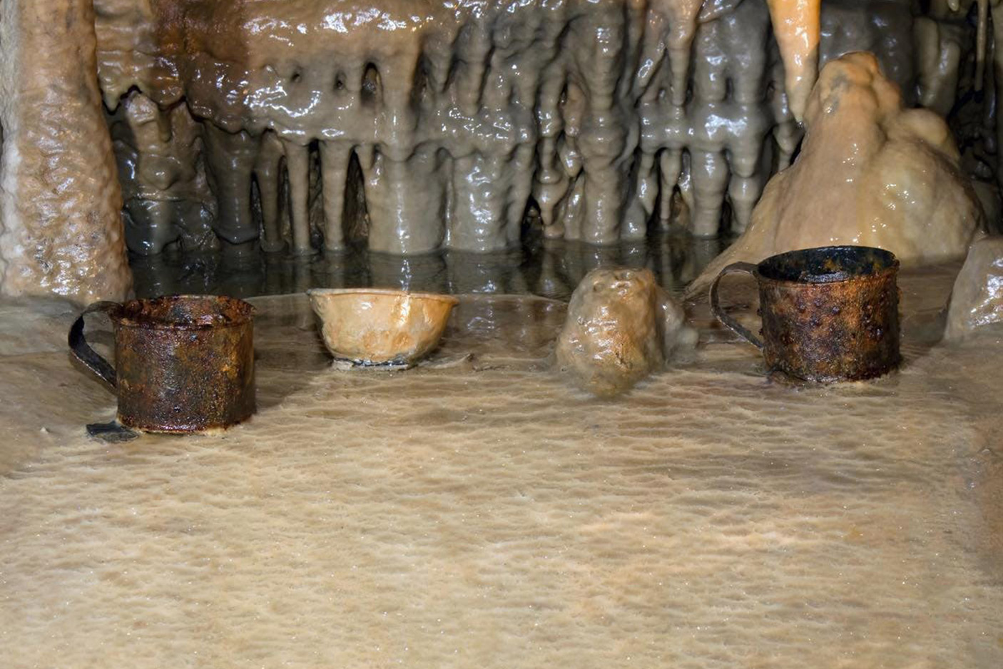cups inside the cave with formations