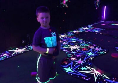 boy standing with glowing stars